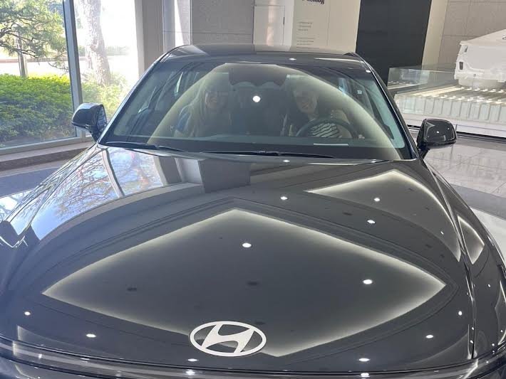 My friends and I inside of a new Hyundai car